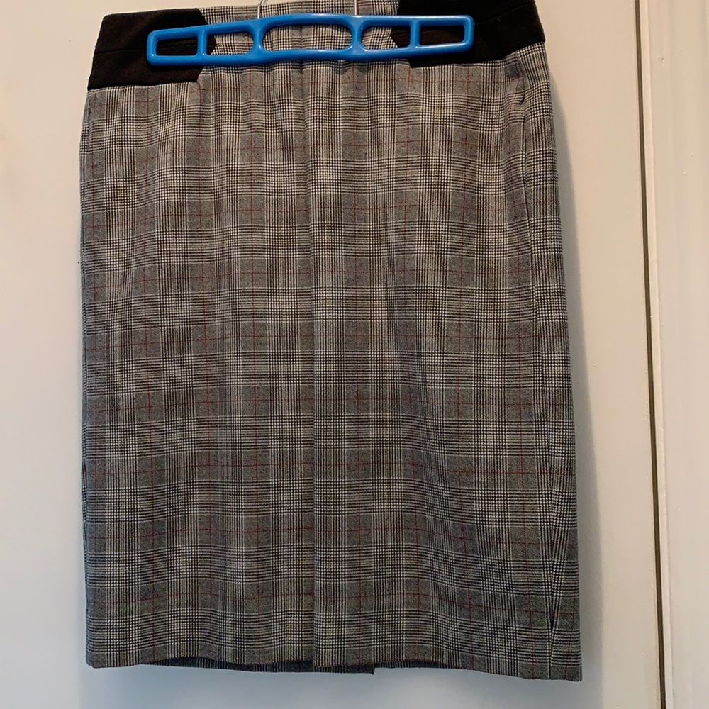 Grey-red-white plaid skirt.
